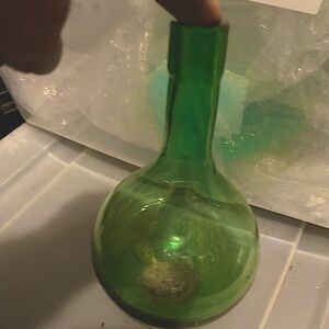 2 vintage hand blown green bottles